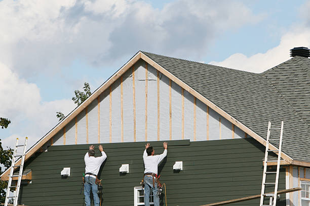 Professional Storm Damage Siding Repair technician working in Prince Frederick, MD